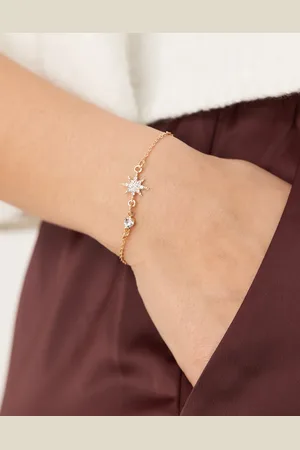 DesignB London Pulsera dorada con diseño de estrellas de pedrería de