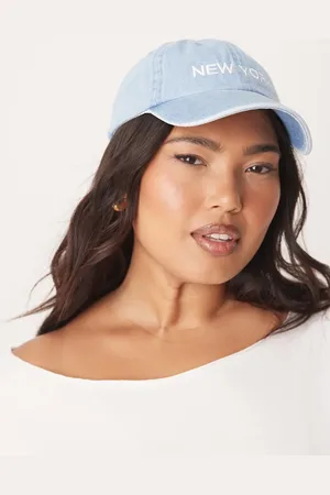 Gina Tricot Gorra azul con lavado medio y diseño "New York" de denim de