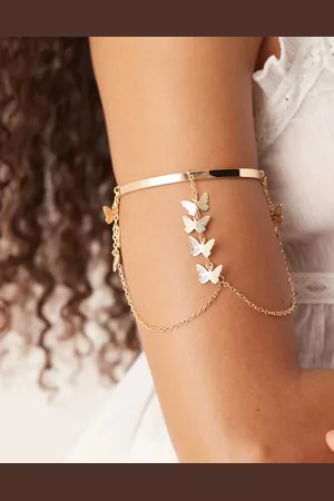 ASOS Brazalete con diseño colgante con mariposas efecto cascada de
