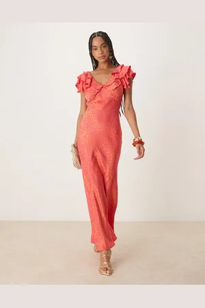 Never Fully Dressed Vestido largo rosa con patrón animal metalizado de jacquard y volantes en las mangas de