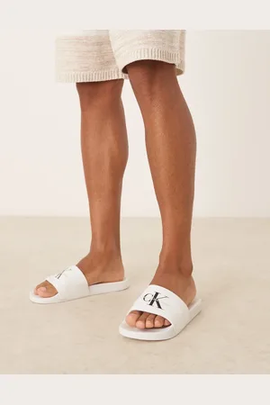 Calvin Klein Sandalias blancas y negras con monograma de -Blanco