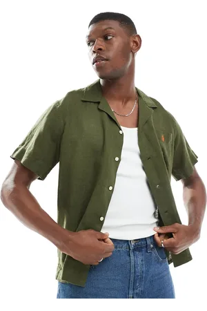Ralph Lauren Camisa de corte clásico extragrande y manga corta con cuello de solapas y logo de icono de lino de
