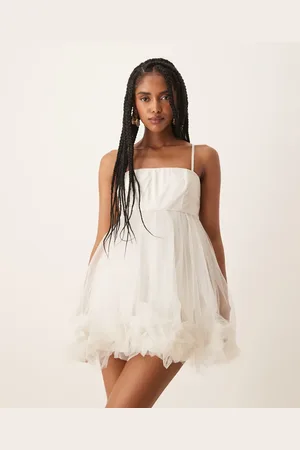 Lace & Beads Vestido corto blanco de estilo babydoll con bajo abullonado de