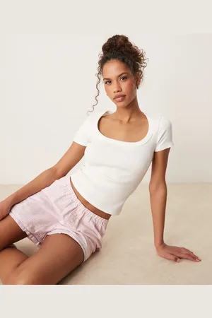 Gina Tricot Top de manga corta y corte slim con cuello ancho de canalé de