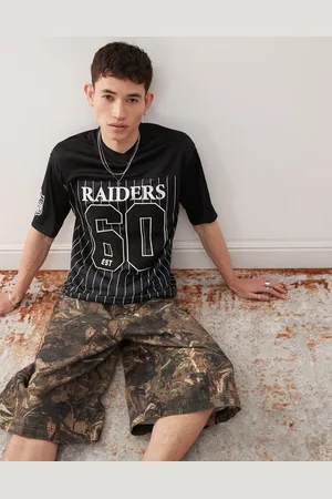 New Era Top a rayas con estampado deportivo de los Las Vegas Raiders de