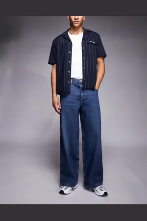 ASOS Vaqueros muy holgados con lavado azul oscuro de