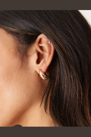 DesignB London Pendientes dorados en forma de lágrima curvada de