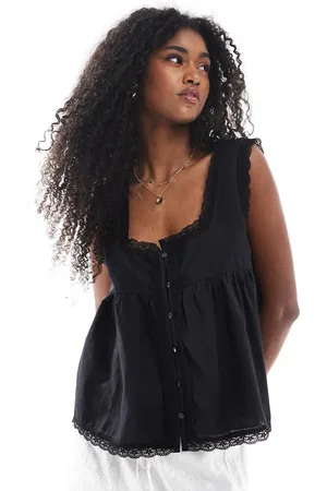 ASOS Top de tirantes de estilo babydoll de algodón con ribete de encaje de
