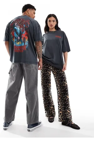 ASOS Camiseta negro lavado unisex extragrande con estampados gráficos con licencia de "Stranger Things" de