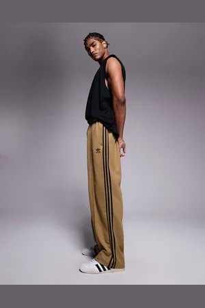 adidas Pantalones de chándal beis Firebird de -Neutro