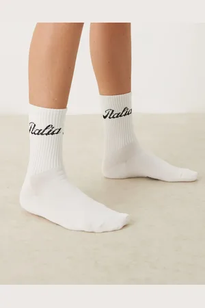 Sui Ava Calcetines deportivos blancos con estampado de texto "Italia" de