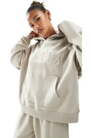 Kaiia Sudadera color extragrande con capucha y logo de (parte de un conjunto)-Beis neutro