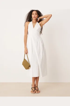 MANGO Vestido semilargo con cintura baja y cuello halter de algodón de