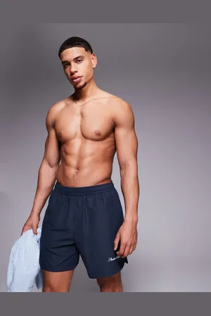 ASOS Shorts de baño de largo medio con detalle bordado de