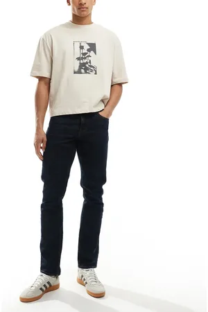 ASOS Vaqueros azules de corte slim con lavado oscuro envejecido de
