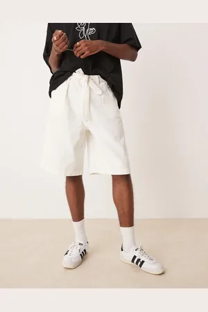 ASOS Pantalones color de corte alargado con pinzas y detalle anudado de -Blanco