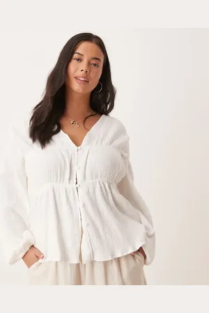 ASOS Top amplio de manga larga con botones en la parte delantera de ASOS DESIGN Curve