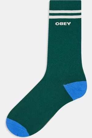 Obey Calcetines verdes de estilo futbolero con estampado gráfico del logo de