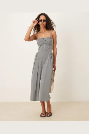 MANGO Vestido semilargo a cuadros vichy negros de tirantes ajustables con cuerpo estructurado de