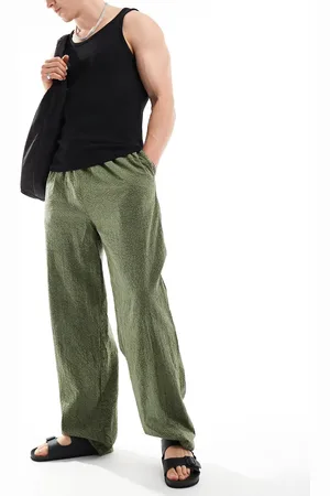 COLLUSION Pantalones playeros caquis de tejido liso texturizado de