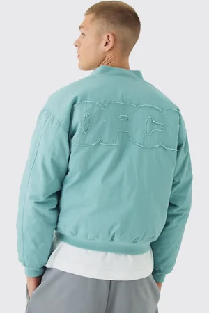 Boohoo Chaqueta Bomber Recta De Sarga Acolchada Con Aplique Ofcl En Claro