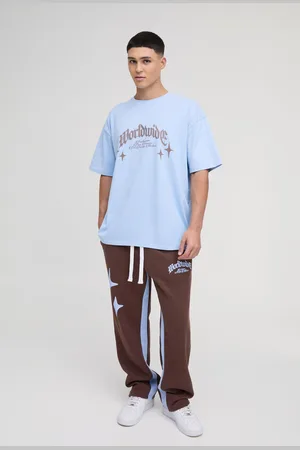 Boohoo Conjunto Oversize De Pantalón Deportivo Con Refuerzos Y Camiseta Worldwide