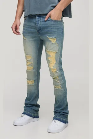 Boohoo Vaqueros Pitillo Elásticos De Campana Rotos Con Pernera Plisada