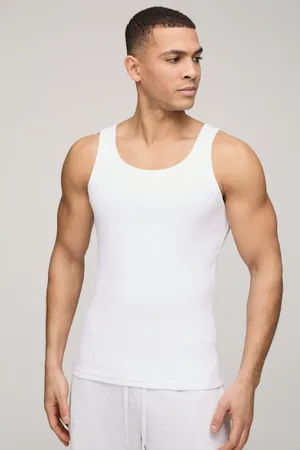 Boohoo Top Sin Mangas Básico De Canalé Ajustado Al Músculo