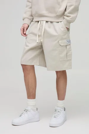 Boohoo Pantalón Corto Tall Cargo Holgado Con Etiqueta De Tela