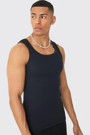 Boohoo Top Sin Mangas Básico De Canalé Ajustado Al Músculo