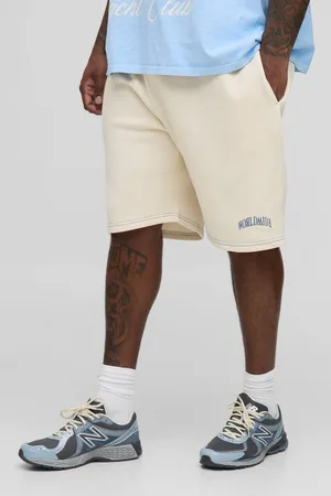 Boohoo Pantalón Corto Plus Largo Worldwide Holgado Con Costuras En Contraste