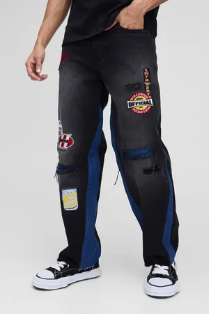 Boohoo Vaqueros Holgados Rotos Con Emblema De Motociclismo Y Refuerzos