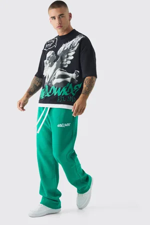 Boohoo Conjunto Oversize De Pantalón Deportivo Y Camiseta Con Capa Falsa Y Estampado Gráfico