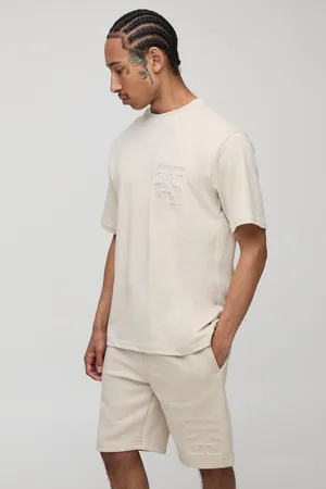 Boohoo Conjunto Ajustado De Pantalón Corto Y Camiseta Con Estampado Universitario 25 En Bajorrelieve