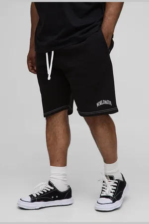 Boohoo Pantalón Corto Plus Largo Worldwide Holgado Con Costuras En Contraste
