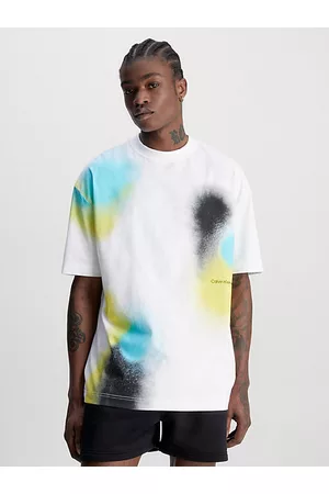 Calvin Klein Hombre Oversize - Camiseta oversize con estampado de spray