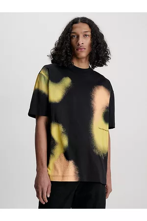 Calvin Klein Hombre Oversize - Camiseta oversize con estampado de spray