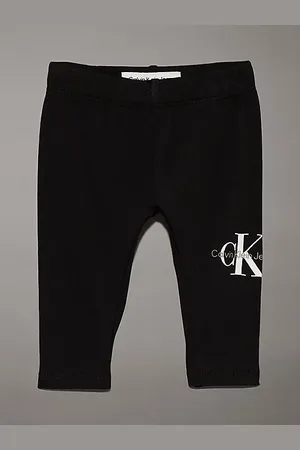 Calvin Klein Leggings slim con logo de recién nacido