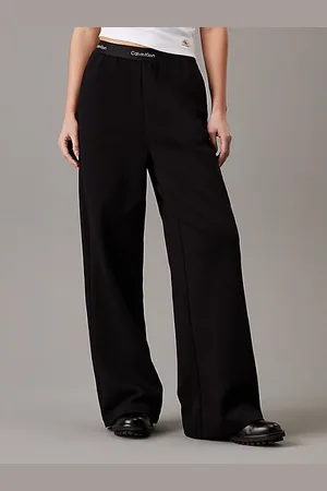 Calvin Klein Pantalones de pernera ancha con cinta con el logo