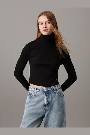 Calvin Klein Top slim de canalé de algodón con cuello vuelto