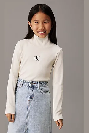 Calvin Klein Top slim de canalé con cuello vuelto