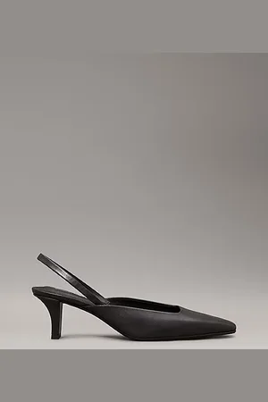 Calvin Klein Zapatos de salón tipo mules con talón descubierto de piel