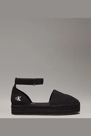 Calvin Klein Alpargatas de lona con plataforma