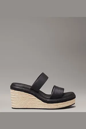 Calvin Klein Sandalias de cuña tipo alpargatas con piel