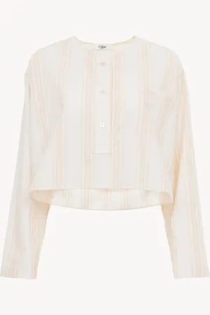 Chloé Top cropped de manga larga de algodón