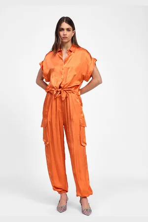 Dixie Pantalones efecto satinado con bolsillos