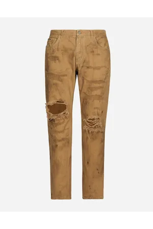 Pantalones beige rotos online hombre