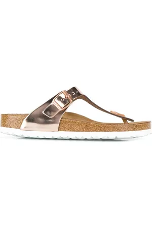 Birkenstock Sandalias metalizadas con tira entre los dedos