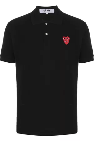 Comme des Garçons Polo a capas con logo