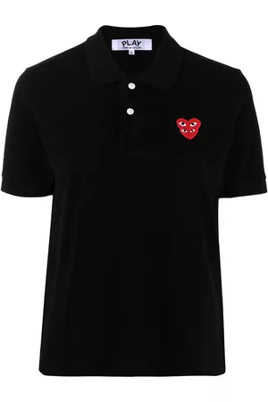 Comme des Garçons Polo con parche del logo